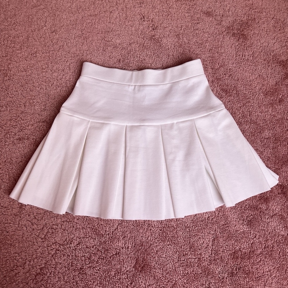 White pleat mini skirt